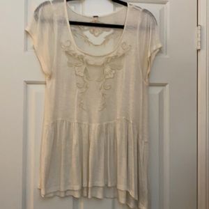 Free People white short sleeve top.